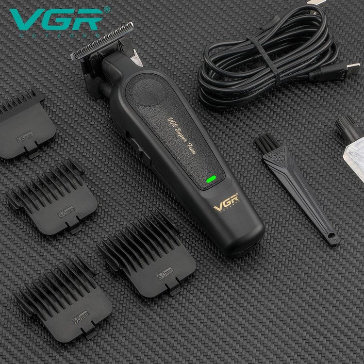 ماشین اصلاح موی سر و صورت با تیغه کربن استیل، باتری لیتیوم یون 2000 میلیآمپر ساعت، شارژ USB، قابلیت تنظیم سرعت و طراحی ارگونومیک و سبک مدل وی جی آر مدل V-995